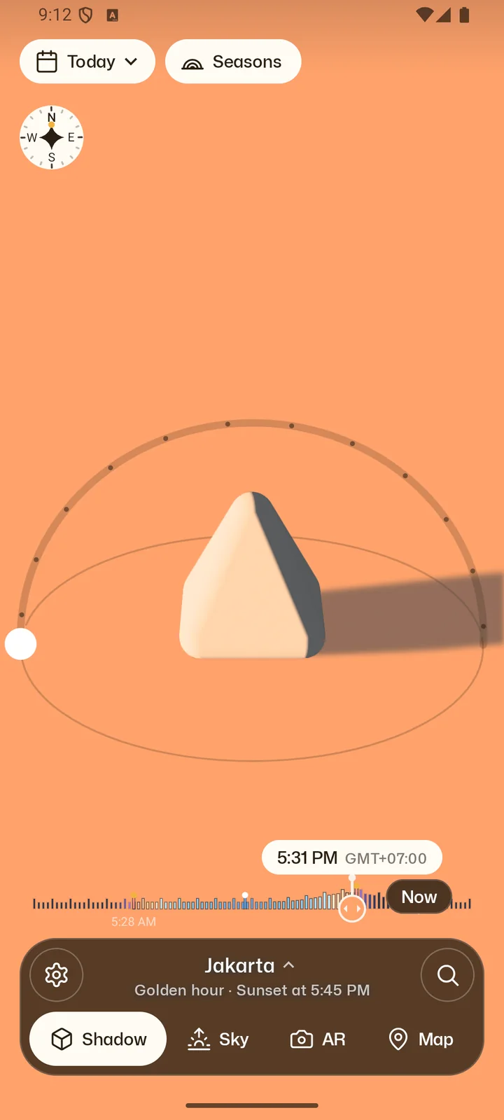 Senja's Instrument in Jakarta at 5:31 PM: a pyramid casting a long shadow east during golden hour.